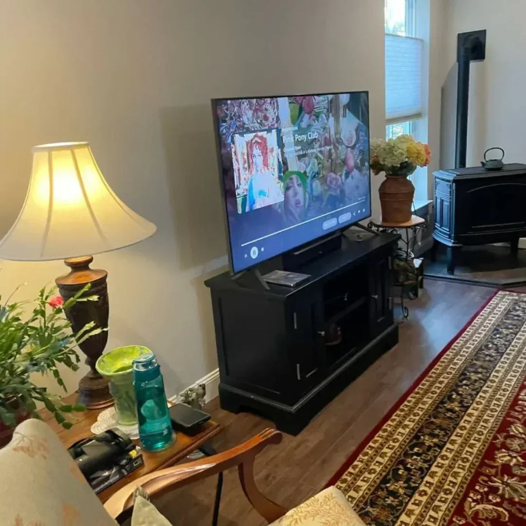 PlayVero TV Box setup in a modern living room entertainment center